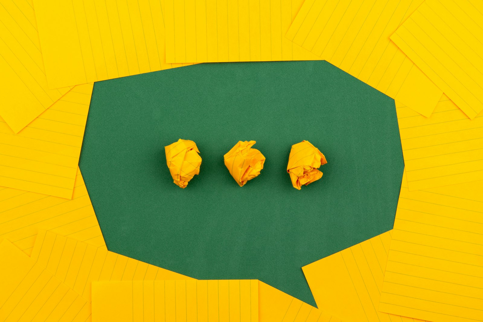 A speech bubble made of notes — asking a question and getting a reply